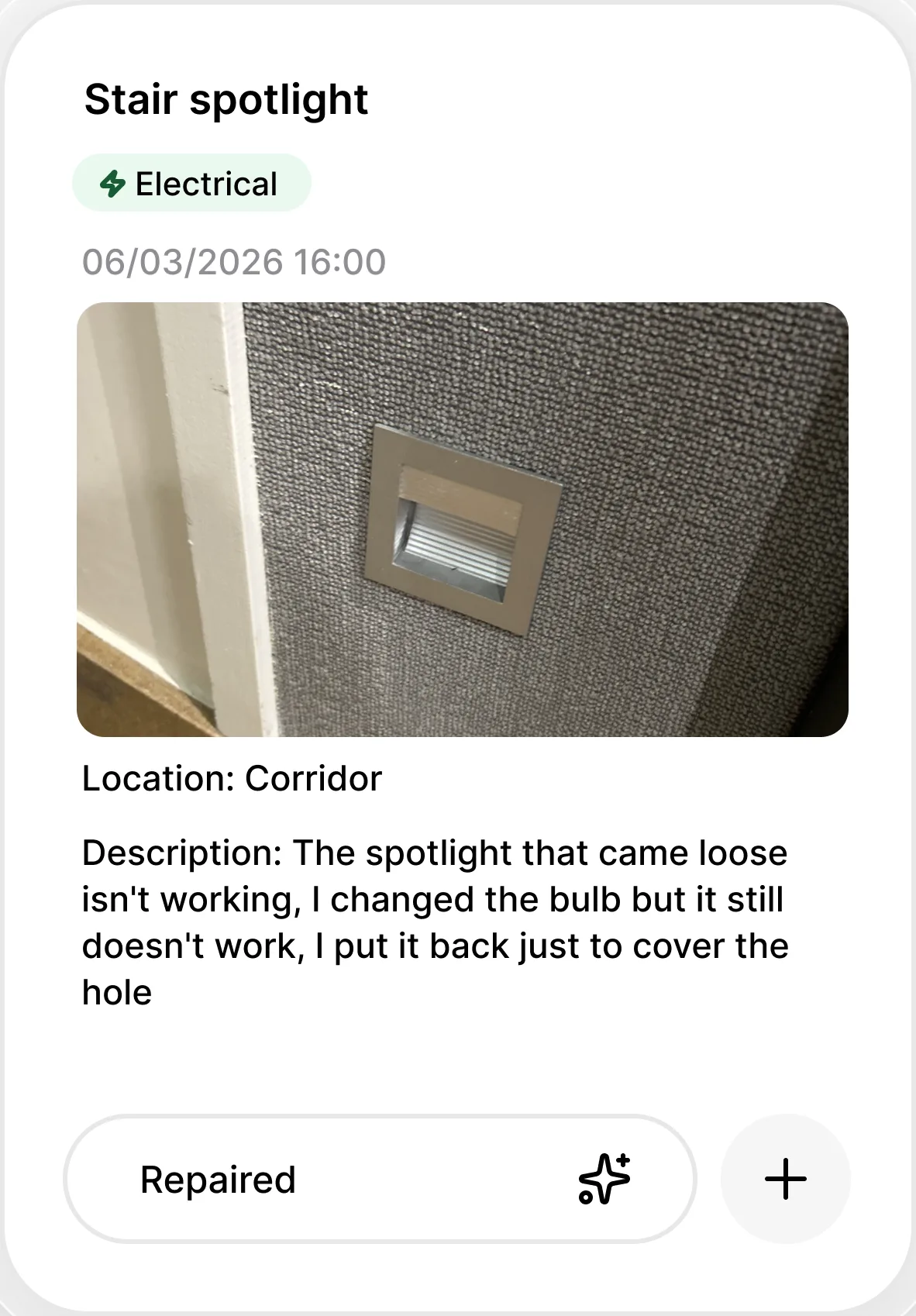 An incident card in hub: photo of the reported staircase spotlight, taken from the floor