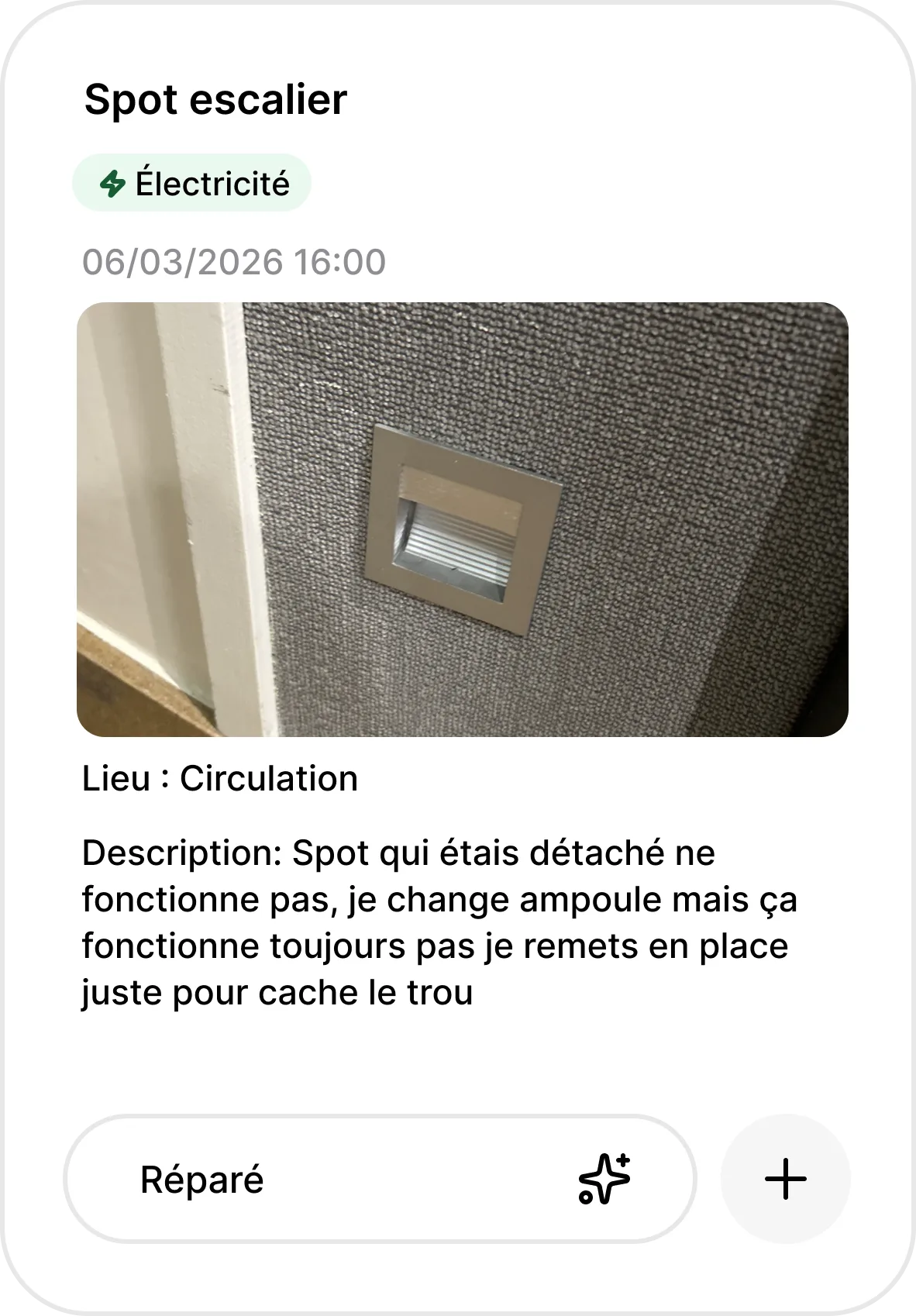 Fiche d'incident dans hub : photo du spot d'escalier signalé, prise depuis l'étage