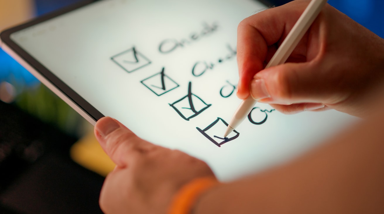 A turn-down checklist ticked from the floor, on a tablet